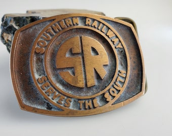Vintage Southern Railway Serves The South Brass Belt Buckle.