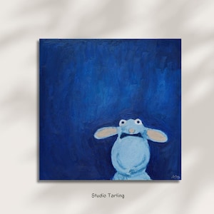 May include: A square canvas artwork depicting a cartoonish blue creature with a bow tie and large ears, set against a dark blue backdrop. The painting is signed and includes the text "Studio Tarling".
