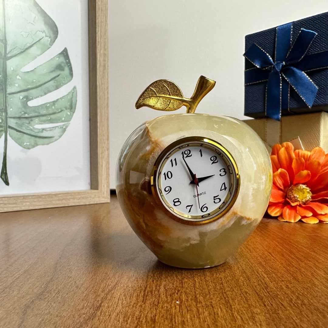 Timeless Elegance: Marble Apple Desk Clock With a Golden Stem and a ...