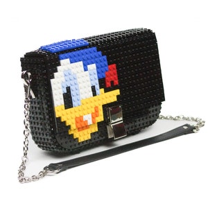 Bolso Clip Donald - Cambia su dibujo cuando quieras - Bloques tipo Lego de alta calidad - Envío Gratuito