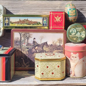 Vintage little tea candy chocolate or cookie tins from Anderson SC