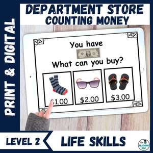 May include: A digital learning activity for children to practice counting money. The screen shows a one dollar bill and three items with prices: socks for $1.00, sunglasses for $2.00, and flip-flops for $3.00. The text "You have" and "What can you buy?" is displayed on the screen.