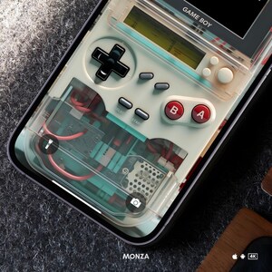 May include: A transparent phone case with a Game Boy design. The case has a white and teal colour scheme with red and grey buttons. The internal components are visible through the clear case. The text "GAME BOY" is printed at the top.