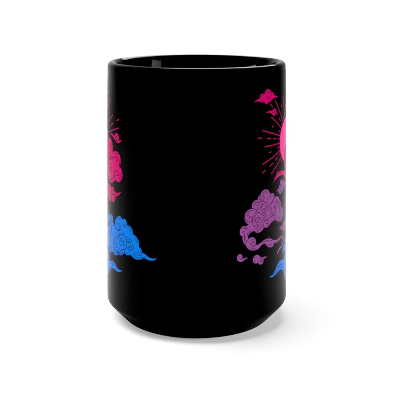 May include: Black ceramic mug with a design of pink, blue, and purple clouds and a sun with rays. The clouds are stylized and have a whimsical look.