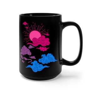 May include: A black ceramic mug with a bi-pride flag themed design. The design features a pink, blue, and purple sun with stylized clouds.