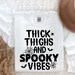 Thick Thighs and Spooky Vibes Sweatshirt funny Halloween Sweatshirt Thick Thighs and Spooky Vibes Sweatshirt funny Halloween Sweatshirt
