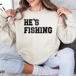 He's Fishing Sweatshirt: Funny Fisherman Shirt immagine 1