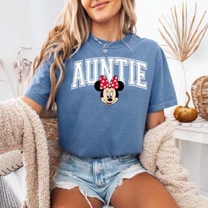 May include: A rustic wooden sign with the text "Welcome to our home" in a handwritten style. The sign features a distressed finish and a simple, inviting design, perfect for a front porch or entryway.