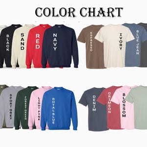 May include: A color chart displaying various t-shirts and sweatshirts in a range of colors, including white, black, red, navy, and blue jean. The text "COLOR CHART" is at the top.