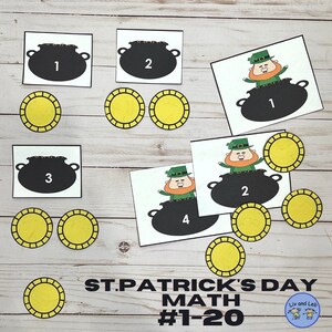 May include: A St. Patrick's Day math activity with leprechauns and gold coins. The cards show leprechauns with pots of gold and numbers 1 through 4. There are also gold coins with a yellow and black design.