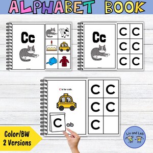 May include: Alphabet book with spiral binding. The book features illustrations of the letter "C" with related images like a cat, cake, and cab. The text "Color/BW 2 Versions" is visible on a yellow banner.