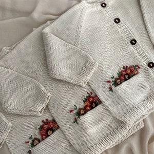 Hand knit baby cardigan, organic cotton embroidered baby cardigan, the unique complement to your little girl&#39;s outfits.