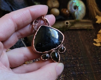 Powerful little Amulet of Black Tourmaline, green (man made) Moldavite and smoky quartz. Copper electroformed and handmade.