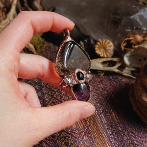 Magical Smoky Quartz Enhydro with moving bubble set with Super 7 Amethyst, Iolite and Herkimer diamond Quartz copper pendant.
