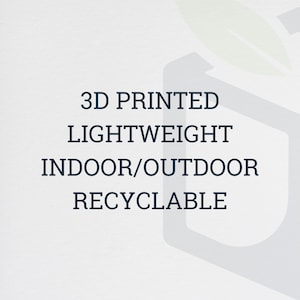 May include: Text on a white background reads: "3D PRINTED LIGHTWEIGHT INDOOR/OUTDOOR RECYCLABLE." The text is in a dark blue color. A light green leaf and a light blue geometric shape are in the background.