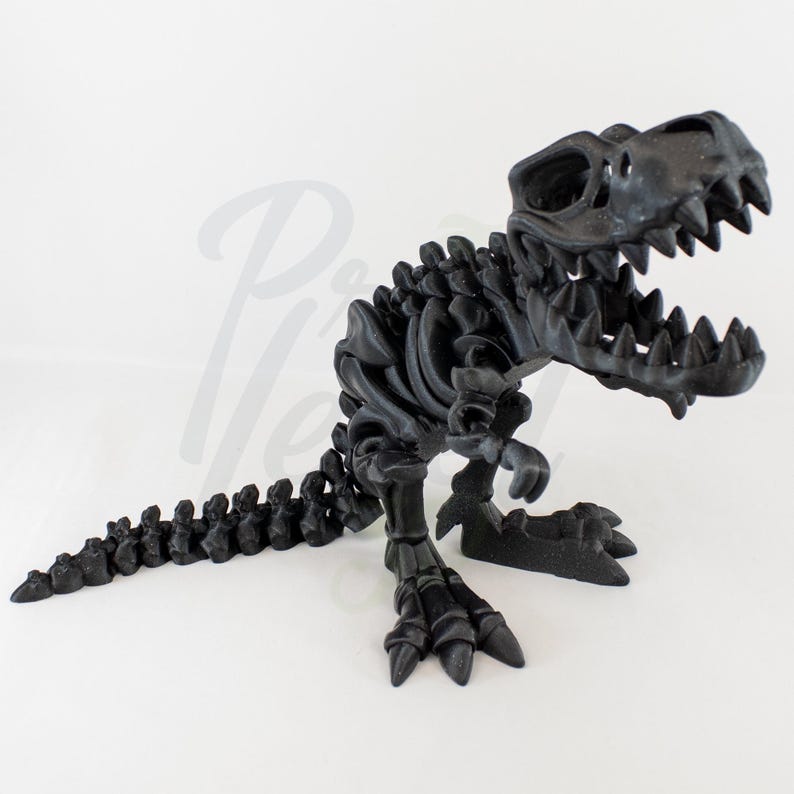 May include: A black plastic dinosaur skeleton figurine. The dinosaur is posed in a standing position with its mouth open. The figurine is detailed with a textured surface to resemble bones.