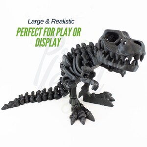 May include: Black plastic Tyrannosaurus Rex skeleton model. The dinosaur is posed standing with its mouth open and its tail extended.  Large & Realistic. PERFECT FOR PLAY OR DISPLAY.