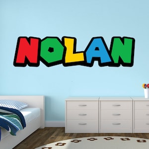 Calcomanía de pared con nombre de estilo Mario personalizada para dormitorio infantil, letras de juego, ladrillos de colores, decoración de pared unisex para niños y niñas, mural de vinilo adhesivo