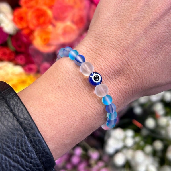 Handmade blue and white Beaded Bracelet with evil eye, proceeds go to provide relief to victims of Hamas terrorist attack in Israel