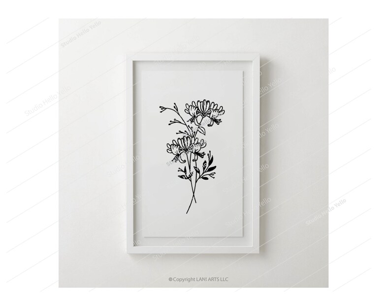 May include: A black and white line drawing of a bouquet of flowers in a white frame. The flowers are stylized and have a simple, elegant design. The frame is on a white wall.