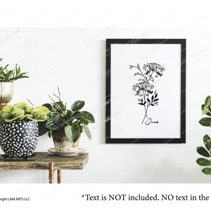 May include: Black and white line art print of a floral bouquet with the word "June" written below. The print is framed in a black frame and hanging on a white wall.