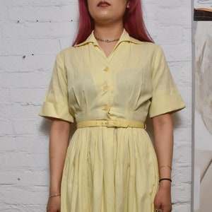 Vintage 1950s Pastel Yellow Pleated Shirt Dress