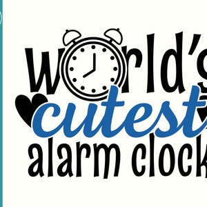 May include: Black and white graphic design with the text "World's cutest alarm clock". The design features a heart on each side of the text and a black alarm clock in the center.