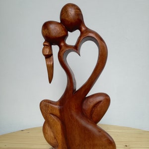 Hand Carved Wood Man Woman Embracing Heart Love