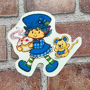 Vintage gloednieuwe sticker bosbessentaart