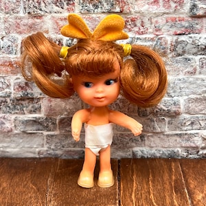 Vintage Tiny Doll