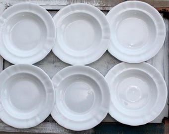 Set of 6 Antique Petrus Regout white ironstone deep plates.