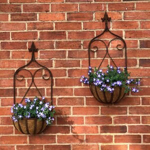 Rustic Wrought Iron Wall Planters With Fleur-de-lis Detail provincial