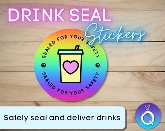 May include: Round rainbow sticker with a white cup with a pink heart and a straw. The sticker says "SEALED FOR YOUR SAFETY" in a circle around the cup. The text "DRINK SEAL Stickers" is in pink neon letters at the top of the image.