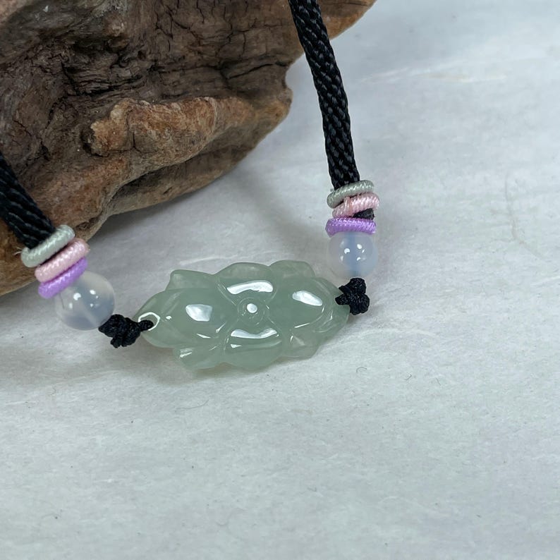 adjustable size natural jade lotus flower bracelet in light green, simple elegant design, jade jewelry