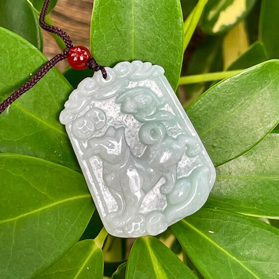 Jade dog pendant discount