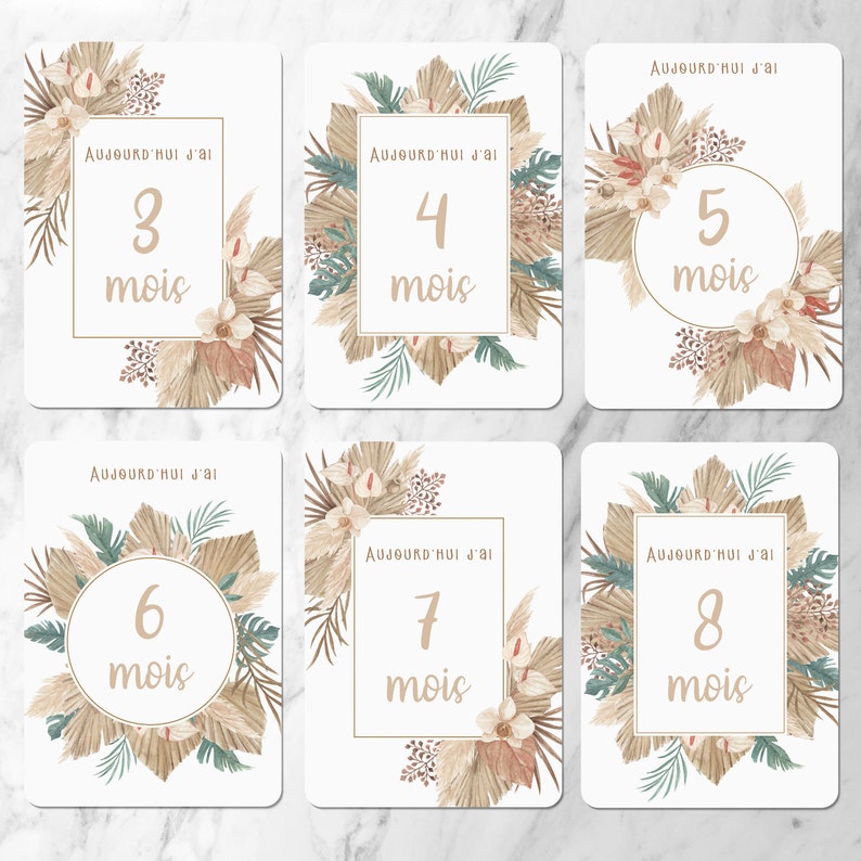 May include: Six printable cards with a neutral color scheme. Each card has a number from 3 to 8 with the word 'mois' underneath. The cards are decorated with a floral design featuring beige, brown, and green colors. The text on each card reads 'Aujourd'hui j'ai'.
