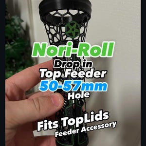May include: Black and green 3D printed top feeder for a vape, labeled "Nori-Roll Drop in Top Feeder 50-57mm Hole Fits TopLids Feeder Accessory".