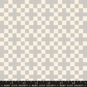 May include: A white and gray checkered fabric with a repeating pattern. The fabric is made by Ruby Star Society.
