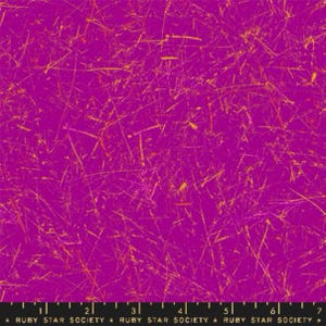 May include: A vibrant fabric with a magenta background and a scattered pattern of thin, golden-yellow lines. The lines appear to be randomly placed, creating a textured effect. The text "RUBY STAR SOCIETY" is printed along the bottom edge.
