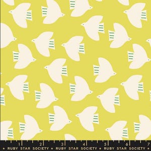 May include: A repeating pattern of white doves with green accents on a bright yellow background. The doves are stylized with simple shapes. The fabric is from Ruby Star Society.