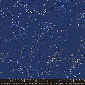 May include: Dark blue fabric with a speckled pattern of gold and light blue dots. The fabric has a celestial or starry night appearance. The bottom of the image has the text "RUBY STAR SOCIETY".