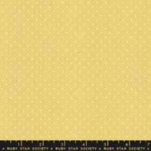 May include: A yellow fabric with a white polka dot pattern. The fabric is textured and has a subtle sheen.