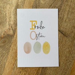 Handgemachte Osterkarte mit Aquarell-Ostereiern und Schriftzug "Frohe Ostern" | Inklusive Briefumschlag in Eukalyptus oder Natur