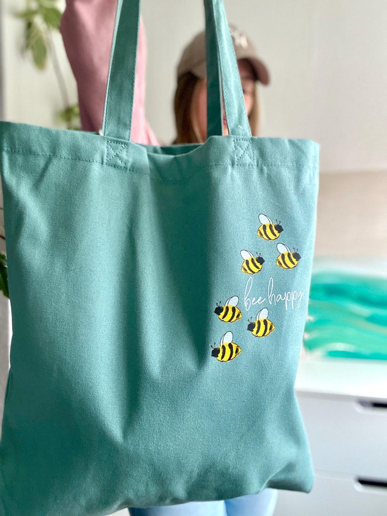 Minimalist cotton tote bag printed with bees in sage green and many other colors | Organic cotton shopping bag with insects bee happy Sage Green