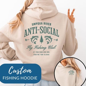 May include: Beige hooded sweatshirt with a green graphic print that says "Umpqua River Anti-Social Fly Fishing Club. If you can see me, you're too close."
