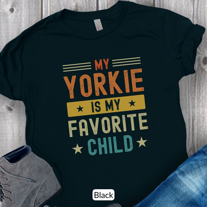 Funny Yorkshire Terrier T-Shirt - My Yorkie Is My Favorite Child. Looking for a cute gift for a Yorkie lover? This funny tee will be sure to bring a smile! Its perfect for the Yorkie dog mom or dad who considers their dog their favorite child.