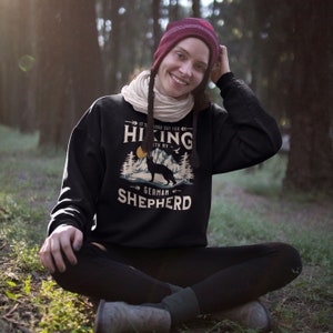 German Shepherd sweatshirt - Good Day For Hiking With My German Shepherd. This GSD shirt in beautiful mountain scene makes a unique and stylish gift for outdoorsy GSD Moms and Dads who love to hike with their dog. Available in black and navy.