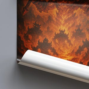 May include: A rolled-up print featuring a fiery, hellish scene. Silhouetted figures with horns and menacing shapes are set against a backdrop of flames and smoke. The print's edge is visible, revealing a white, glossy surface.