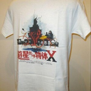 May include: White t-shirt featuring a colorful graphic design. The design includes a dark, abstract shape with red and orange tendrils, a group of faces, and Japanese text. The shirt is made of a soft, comfortable material.