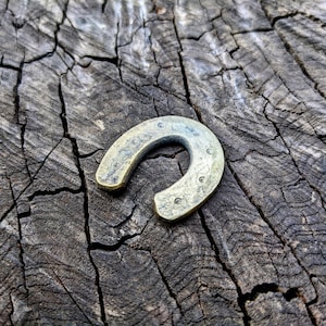 Small mini horseshoe, hand-forged